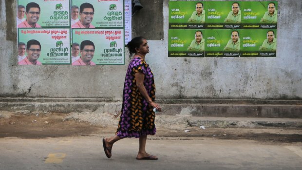 Election posters in Colombo on Tuesday. 