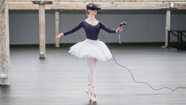 Dancer Sharni Spencer uses the Google Tilt Brush to create a 3D artwork in virtual reality. 