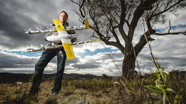 Project Wing co-leader James Ryan Burgess with the delivery drone set to be trialled at Fernleigh Park. 