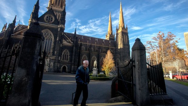A parishioner at St Patrick's Cathedral on Sunday morning. 
