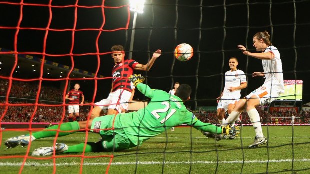 The winner: Dario Vidosic scores the goal that puts the Wanderers into the grand final.