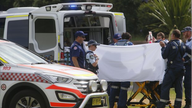 The toddler is treated by emergency services before being taken to hospital.