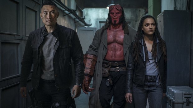 Daniel Dae Kin (left) plays Major Ben Daimio,  David Harbour is Hellboy and Sasha Lane stars as Alice Monaghan in the film.