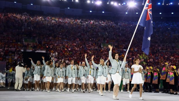 Olympic honour: Anna Meares carries the flag during the Rio opening ceremony.