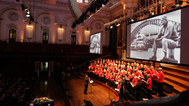 A trade union choir fills Sydney's Town Hall with music for Tom Uren's state funeral.
