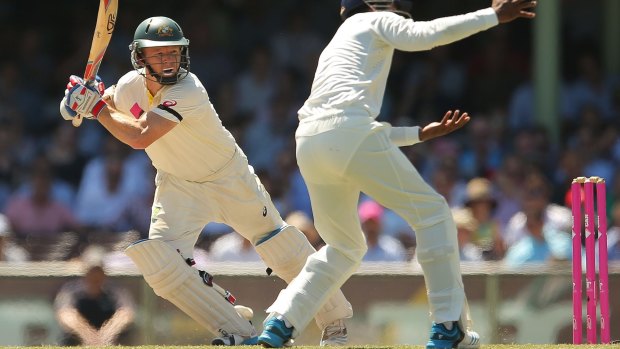 Chris Rogers plays a cover drive during day four of the fourth Test between Australia and India at Sydney Cricket Ground on January 9, 2015.  