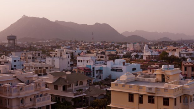 In the Indian city of Udaipur, flat roofs become places for living, yoga, laundry.