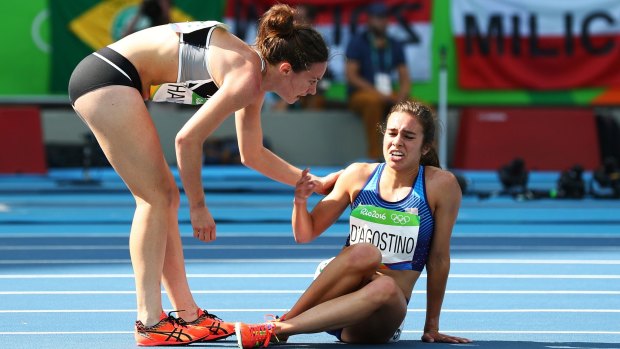 True sportsmanship: Nikki Hamblin, left, checks on American runner Abbey D'Agostino.