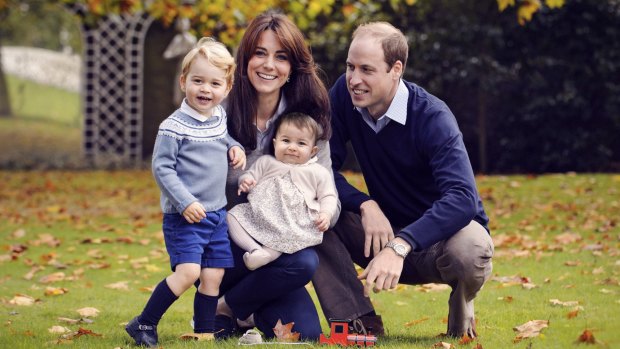 The Duke and Duchess of Cambridge with their two children, Prince George and Princess Charlotte, in a photograph taken late October 2015 at Kensington Palace in London.