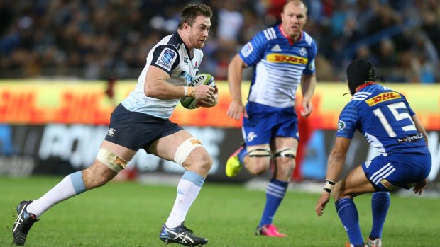On the charge: Jed Holloway heads into the Stormers defence for the Waratahs at Newlands.