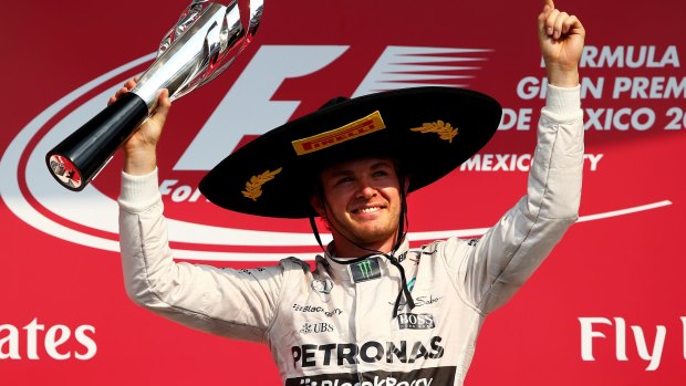 Nico Rosberg celebrates on the podium.