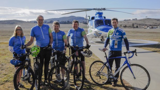 Lifecycle rider Krissi Brewster, regional ride co-organiser Tony Cory, coordinator Mark Blake, rider Kevin Herring and Snowy Hydro SouthCare helicopter CEO and Lifecycle ambassador Chris Kimball.