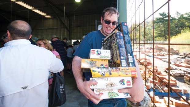 Huge Lego sale at The Green Shed has Mike Bassett barley able to hold all the lego sets he grabbed. Photo: Dion Georgopoulos