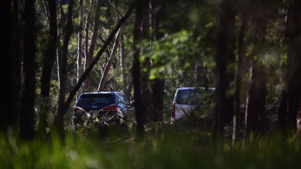 Police at the scene in Kurrajong where two people were found dead on Monday morning. 