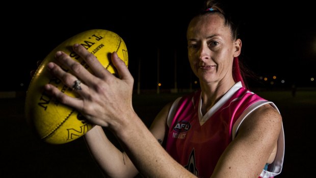 Former basketballer Michelle Cosier is now playing in the Canberra Women's AFL.