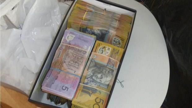 Police allegedly found $300,000 in cash during the raid.
