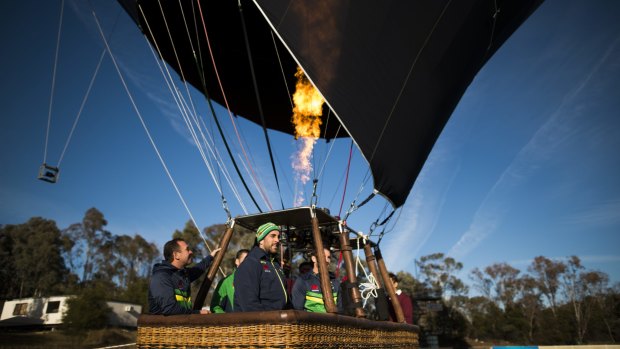 Up, up, and away? The Raiders fire-up the Abode Hotels hot air balloon, said to be the largest operated in Canberra.