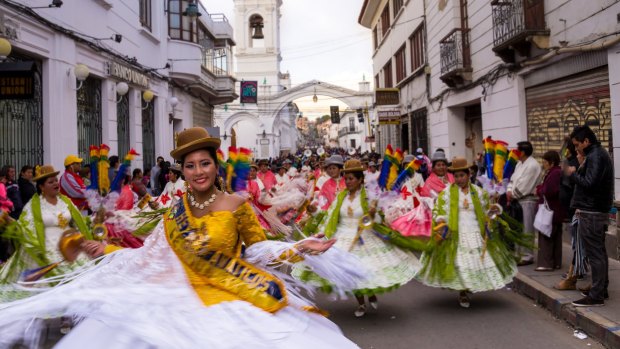 Thousands of Bolivians dress up for the annual festivity to honor the Virgin of Guadalupe.