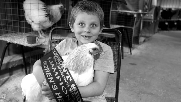 Paula Heelan's photograph of Rhys Reeves and his Coronation Sussex hen and first prize ribbon is the winner of the June Clique Challenge. 
