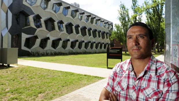 Security guard Shane Stuart, an ANU employee for 13 years, 
outside the university's Research School of Chemistry.