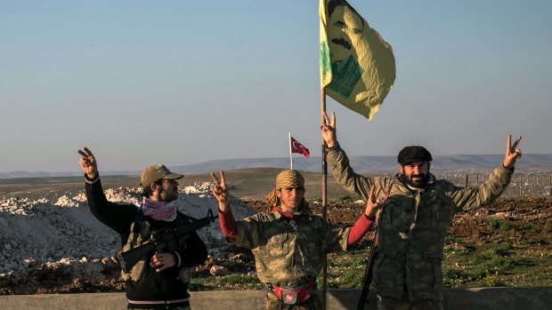 A file picture of Syrian Kurdish militia members of the YPG in Aleppo province, Syria. 