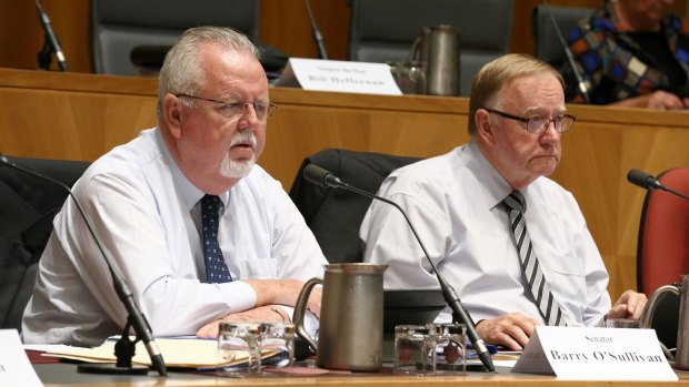 Senators Barry O'Sullivan and Ian Macdonald.