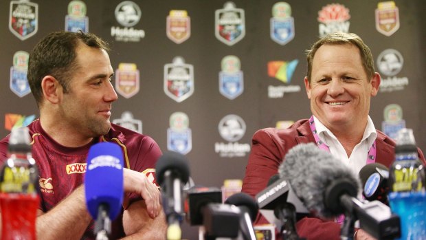 Feedback: Maroons skipper Cameron Smith and coach Kevin Walters often get their heads together for a chat. 