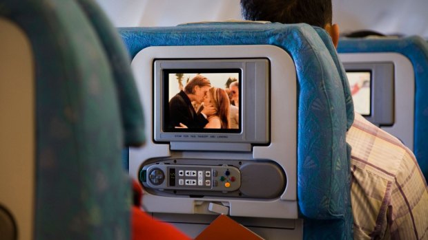 Do you compulsively watch cheesy movies on a plane? This might be the reason why.