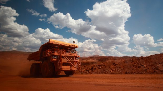 Iron ore prices remain in mid-correction,    says UBS.