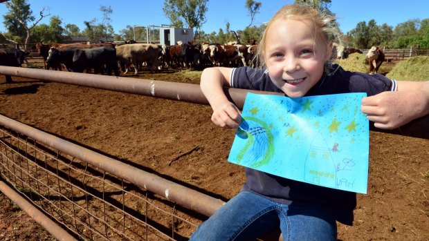 Bailey Brooks, 6, who drew the winning picture that will go on the side of the rocket that launches the NBN satellite.