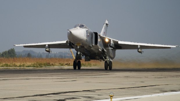 A Russian Su-24 takes off on a combat mission at Hemeimeem airbase in Syria in October last year. 