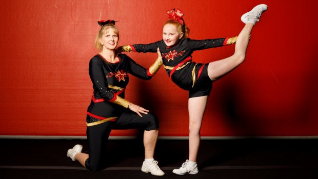 Heat Cheerleading owner Bronwyn Morgan with her 10-year-old daughter Dani McHugh.