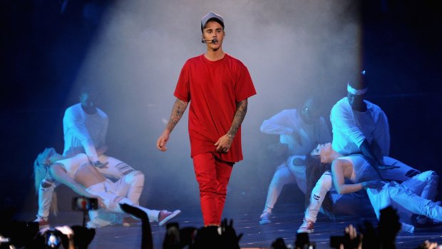 Justin Bieber performs on stage.