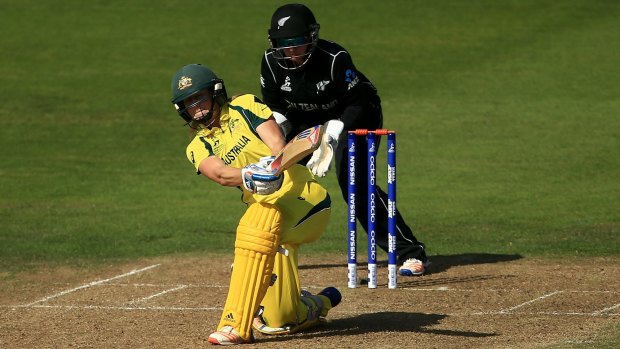 Ellyse Perry hits out with scores tied.