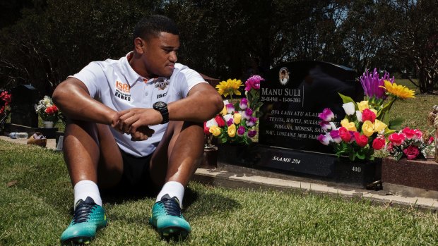 "I want to make my dad proud": Wests Tigers rising star Mosese Suli at his father's grave.