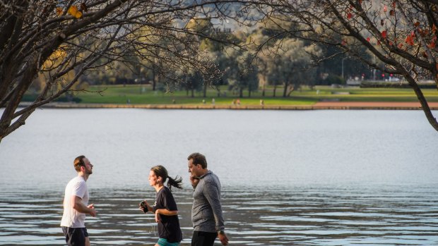 Residents soak up the picturesque surroundings of Lake Burley Griffin earlier this week.
