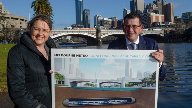Public Transport Minister Jacinta Allan and Premier Daniel Andrews on the banks of the Yarra on Wednesday. 
