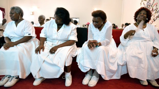 Hall United Methodist Church.
On a Sunday morning Singing and Praying Bands of Maryland and Delaware congregate to sing and pray together. Their white dress is intended to represent the uniforms worn by slaves.
