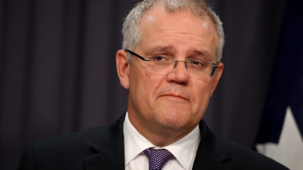 Treasurer Scott Morrison's delays over a return to surplus has Australia's sovereign rating classified as 'on watch' by S&P.