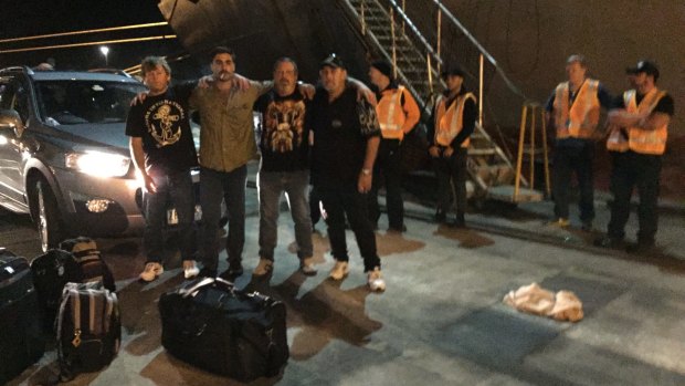 Crew members of the MV Portland on the wharf after being removed from their ship in the early hours of Wednesday morning.