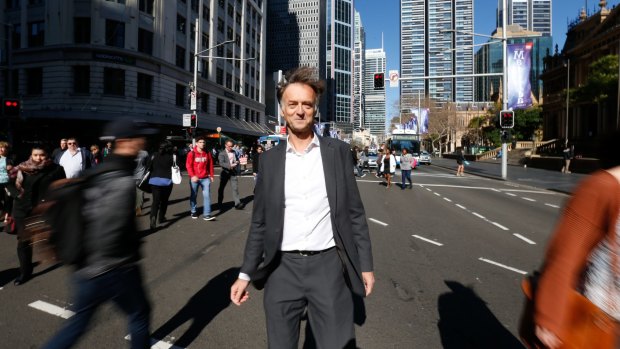 Light rail designer Thomas Richez stands at the intersection of George and Park streets in Sydney.