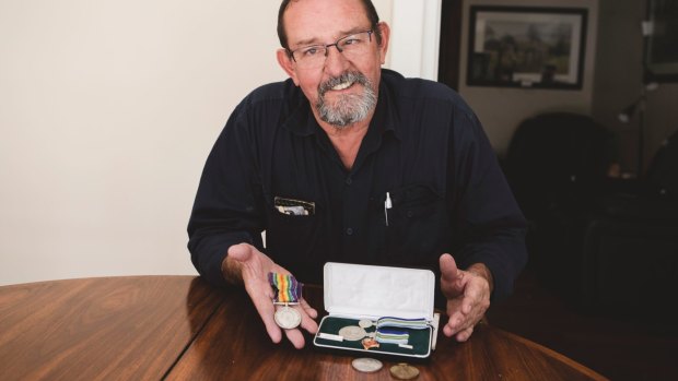 David Chittick has been reunited with his father and great uncle's war medals and coins, that were stolen more than 20 years ago. 