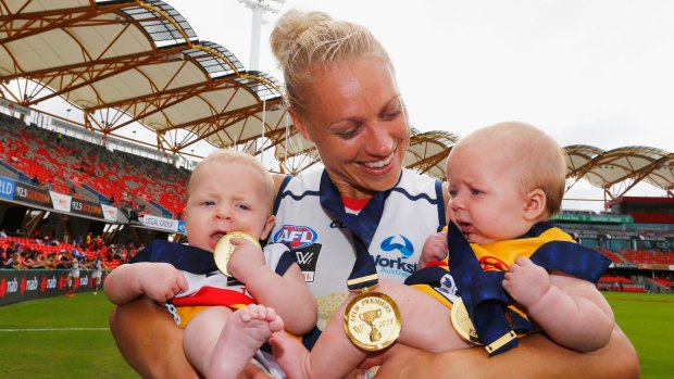 Erin Phillips of the Crows celebrates with her twins Blake and Brooklyn.