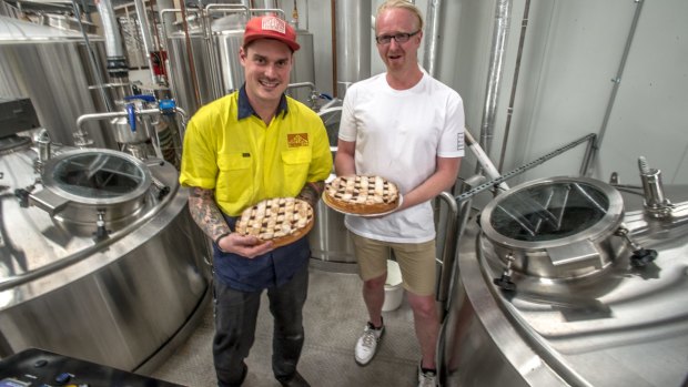 Capital Brewing head brewer Wade Hurley and Three Mills Bakery head baker Justin King collaborate on a special cherry pie Christmas ale using real cherry pies. 