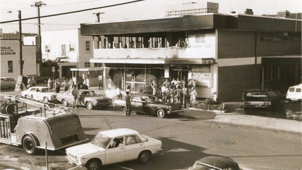 Onlookers outside Brisbane's burnt-out Whiskey Au Go Go in March 1973.