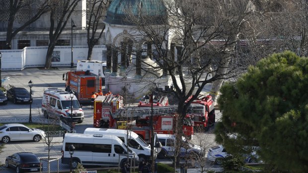 Rescuers and police arrive at the blast site after an explosion in central Istanbul's historic Sultanahmet district.