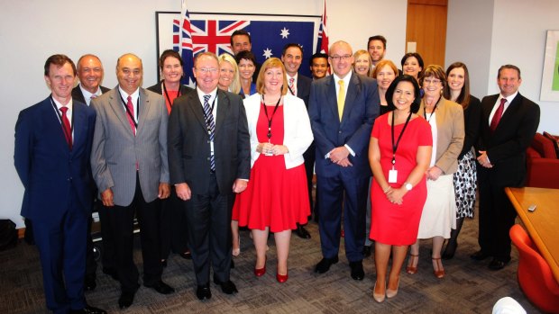NSW Labor leader Luke Foley (centre right) and his new MPs on Wednesday.