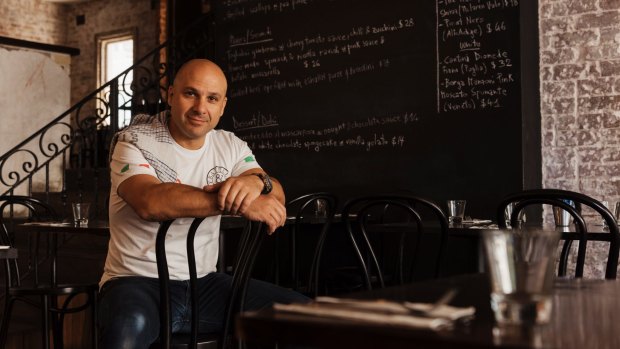 Robert Galati, at his Italian restaurant Fratelli & Co in Concord, Sydney, says he has lost 16 per cent off his bottom line to MenuLog.