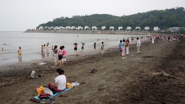 Hac Sa black sand beach Macau.