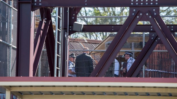 Police examine the scene of the accident on Wednesday.